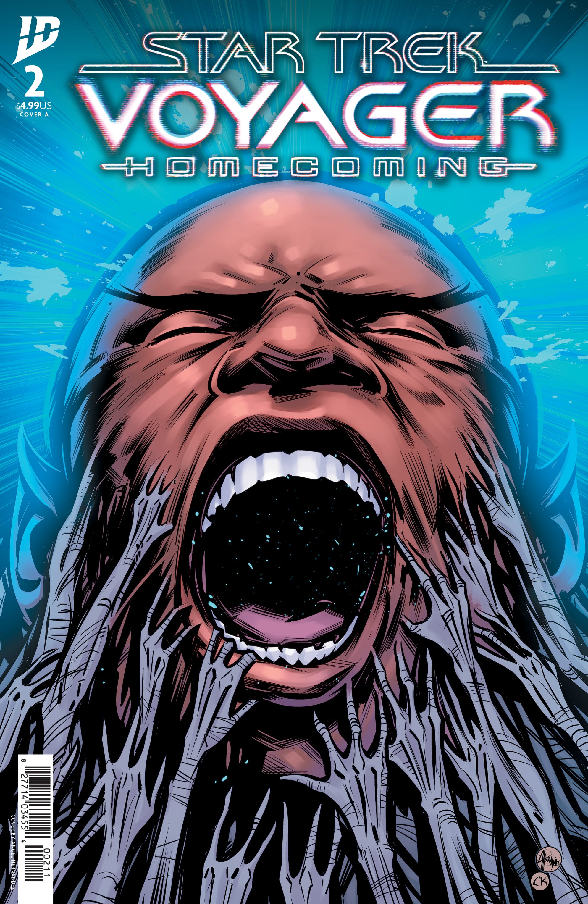 Voyager Homecoming issue 2 cover A by Angel Hernandez, of Tuvok screaming in pain as many alien Species 8472 hands claw at his face